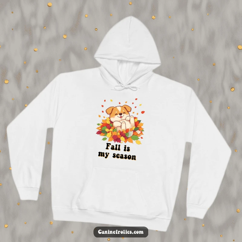 Funny hoodie depicting a dog blissfully rolling amongst a heap of vibrant, multicolored autumn leaves, showcasing pure seasonal happiness and comfort.
