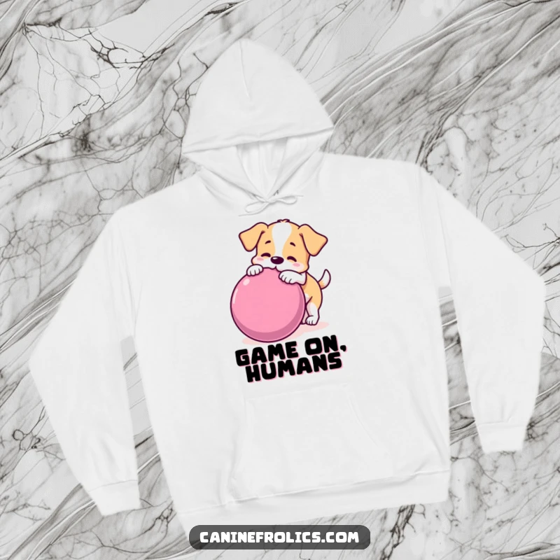 Funny dog hoodie showing a playful dog nudging a huge rolling ball, perfect for warm comfort and humorous enjoyment.