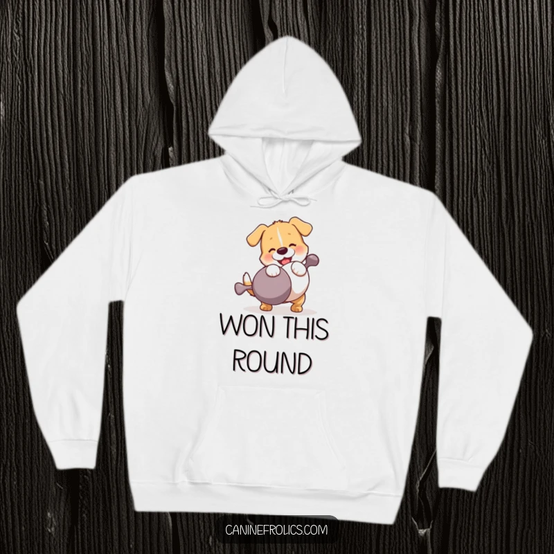 Funny Dog Hoodie: A dog engaged in a comical wrestling match full of vigor with an enormous squeaky toy, radiating pure, unadulterated fun.